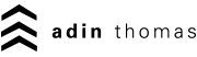 The AdinThomas Logo