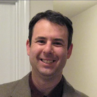 A headshot photo of Dr. Benjamin Bittner, an optometrist at Greenacres Eye Associates