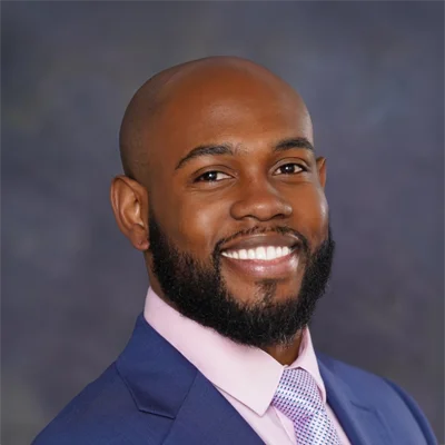 A headshot photo of Dr. Charlton Q. Butts